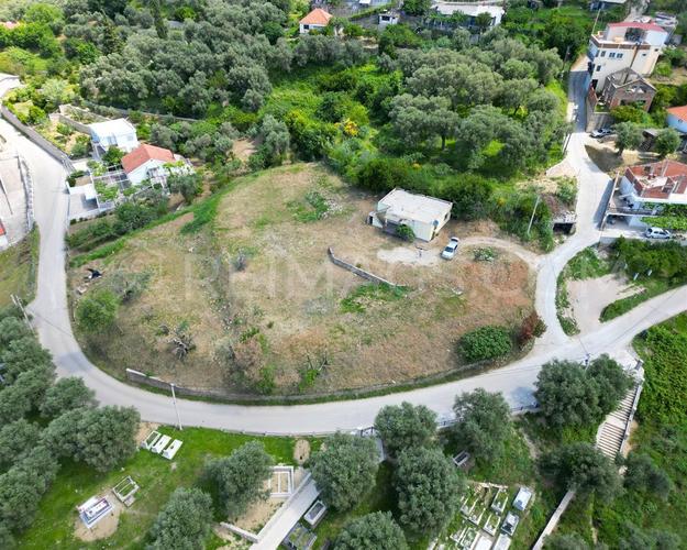 Plot in Tomba with old ruin house and a sea view